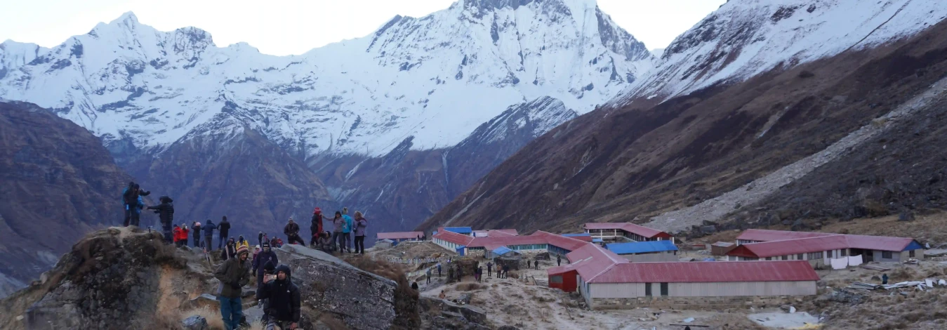 The panoramic view of Annapurna mountain ranges, from Annapurna Base Camp, with lot of trekkers, clicked by North Nepal Trek
